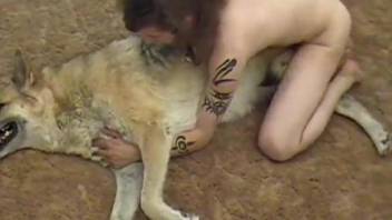Nude man likes making out with the dog
