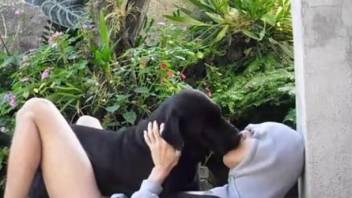 Hooded dude getting fucked deep and hard by a dog