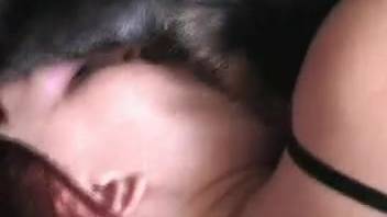 Ginger-haired woman and her frisky ebony pup in amazing bestiality romp