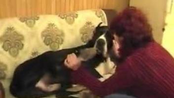 Redhead wife zoophile gives a gorgeous head for a trained doggy