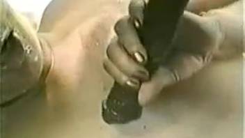Leashed babe gets a facial cumshot right at the finish