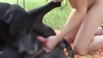 Skinny European babe getting fucked by a dog outdoors