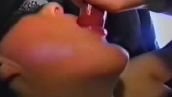 Golden-haired woman employing her teasing lips to induce the dog's climax
